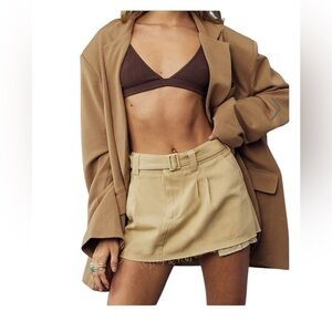 LIONESS Rhode Mini Skirt, a highly popular low-rise utility piece by the Austral